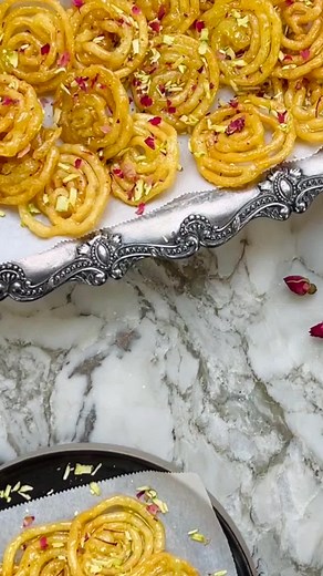 Homemade Jalebi is easier and more fun than you might think 💫⁠ ⁠ Here is mom’s recipe for the best Jalebi!! Needs no fermentation, is ready in under an hour, and stays perfectly crunchy for days! ⁠ These Instant Jalebis have it all—light crisp dough to soak up sweet cardamom-saffron syrup and that essential lemony tang. ⁠ ⁠ If you’ve always wanted to try making your own at home this is your sign to do it! Happy Dussehra!! ⁠ ⁠ The full recipe is linked in the bio. #yum #indianrecipes #foodontikt