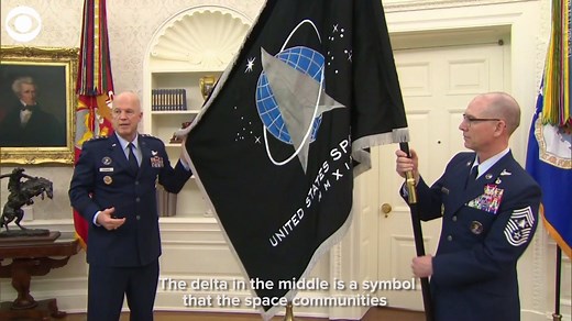 SPACE FORCE FLAG: The official flag of the Space Force - the sixth branch of the U.S. military - was unveiled in the Oval Office on Friday. It's the first new service and service flag in more than 72 years. The flag features the Seal of the United States Space Force, which was approved by President Trump in January. | CBS Newspath