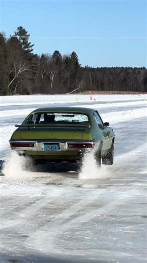 Pontiac Tri-power with hood cut out. Sounds good coming of the line at the 1/8 mile ice drags!