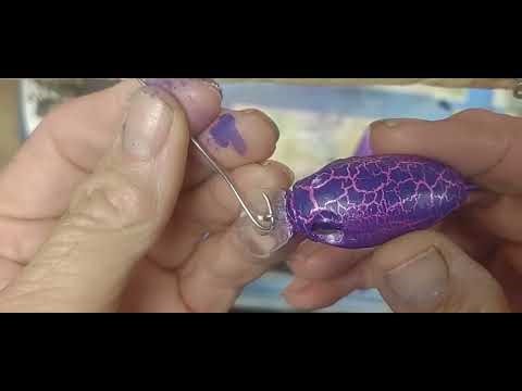 Custom painting a crankbait.