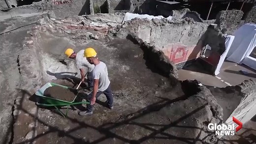 Archeologists work to uncover new bones discovered in Pompeii