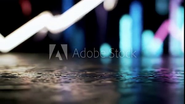 Illuminated abstract lines of light dance on a reflective wet pavement, showcasing modern urban energy and dynamic motion