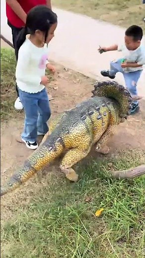 Fake dinosaur robot in park #shortsvideo