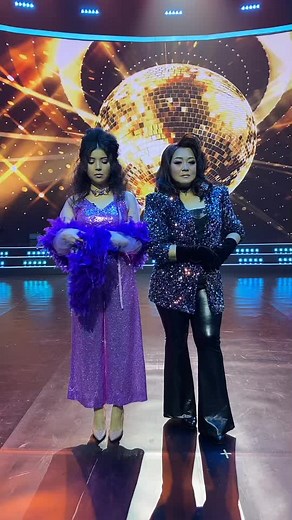 Dazzling Dance Performance Under Disco Ball Lights