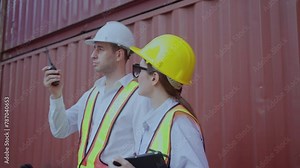 Employees monitor the global transportation industry concept of container trucks in container yards, commercial port and warehouse management systems, logistics, and import and export goods. Stock Video
