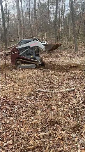 Sons first time operating the Takeuchi TL130 Skid Steer