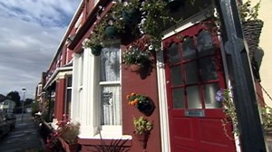 John Lennon’s childhood home sold at auction