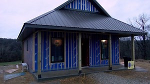 Local construction company builds prefabricated straw bale home