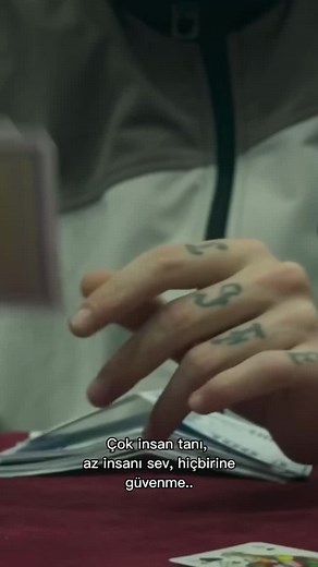 Mastering Card Tricks with Tattooed Hands