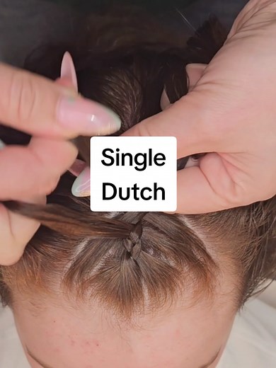 A Single Dutch Braid from the top of the head. Always add hair from the hairline up to the braid in a V shape. Get crisp clean lines using long nails or a Tail Comb! For more in-depth Braid Tutorials check out my link in Bio. The Bonnie Braids Digital Courses are so much easier to follow than my videos here - it has step by step guidence, slower & beginner focused, clear explanations of why things go wrong and real techniques that actually make a difference ❤️ #LearnToBraid #HowToBraid #DutchBra