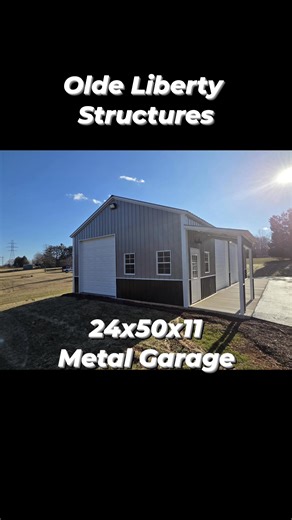 This 24x50x11 Metal garage is Metal framed, fully insulated and looks great with this concrete apron and paved driveway! Let Olde Liberty Structures build your turn key metal building or garage. Bedford, VA #metalbuildings #metalbuildingcontractor #metalbuildingcontractorvirginia #garage #workshop #barn | Olde Liberty Structures