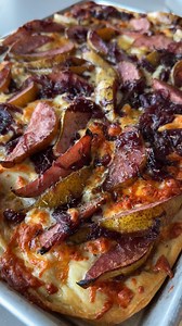 Roasted pear & caramelized onion pizza made with Dollar General finds, that somehow tastes even better than it looks. Liven up your next holiday gathering with this homemade wonder. #f52partner Recipe: https://food52.com/recipes/best-sheet-pan-pizza-with-roasted-pears-and-caramelized-onion?utm_source=facebook&utm_medium=social&utm_campaign=dhfacebook&utm_content=app.dashsocial.com/food52/library/media/614614643 | Food52
