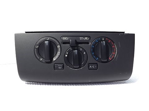 Nissan Versa heater control replacement. Removing heater control cables.