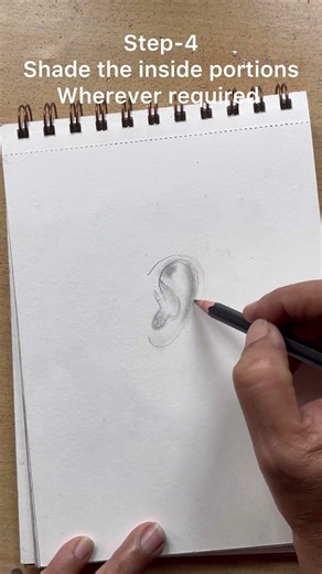 A step by step process of drawing of human ear