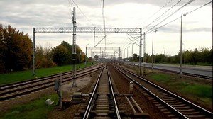 Download A close-up of the tracks captured while the train is in motion creates a dynamic sense of speed and travel. This shot conveys the energy of the journey and opens up new horizons. for free