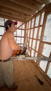 Cutting House wrap out with a chainsaw around the window ￼