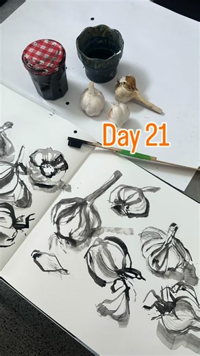 Debbie Mackinnon on Instagram: "Day 21 -S A M E BUT D I F F E R E N T Three bulbs of garlic – similar, but definitely not the same. I drew them three times, moving the bulbs around each time and noticing what changed. The other big difference was how I drew them. I used ink with an old toothbrush taped to the end of a stick. Why the long stick? It forces a different grip and keeps things interesting. Why the toothbrush? It makes unexpected marks that somehow felt right for garlic – scratchy, lay