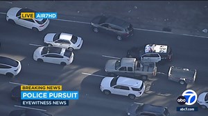 Driver weaves through traffic on Los Angeles freeway during wild police chase: VIDEO