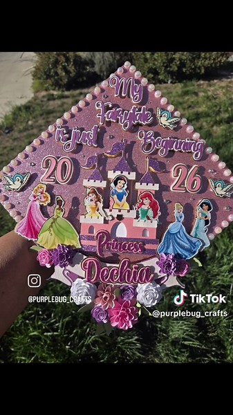 Disney Princess Graduation Cap with flowers and roses. light pink base, pearl and rhinestone embellishments. DM for info. #disneyprincess #gradcap #gradcapdesign #gradcapideas #disneycastle