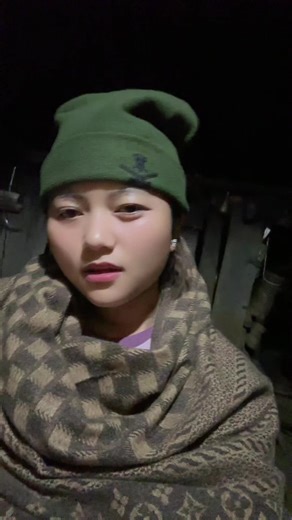 Cozy Indoor Vibes with Green Beanie and Patterned Shawl