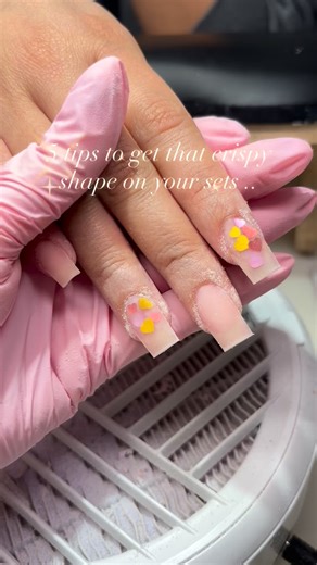 Kayla Medina on Instagram: "1. Build your structure first — don’t rely on filing to fix it Your bead placement should already guide the shape. Check that apex ! 2. File from the side, not the top Turn the finger sideways and file the sidewalls straight up and down. This prevents bulky edges and keeps the nail looking slim and intentional instead of thick or lumpy. 3. Keep your file flat and controlled. Let the file do the work. Angling it too much will round your edges and ruin sharp lines. ✨Fla