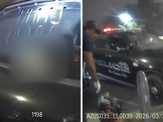 Dead body found inside cop car parked outside police headquarters, video shows