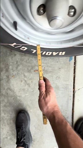 Doing a toe adjustment for front end car alignment.