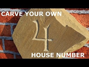 Hand carved stone house number