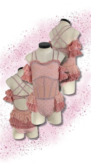 Dance Costumes | Ballroom Dresses | Performance Wear on Instagram: "✨ Blush Elegance ✨ Soft, romantic, and full of delicate sparkle — this dreamy pink costume blends intricate lace, crystal accents, and playful ruffles for the perfect stage-ready look. Designed to move beautifully with every turn and leap 💕 #DanceCostume #LyricalCostume #CustomDancewear #StageCostume #PerformanceCostume #DancewearDesign #CompetitionCostume #SoloCostume #CustomCostume #MadeToShine #dancecostumesstudio"