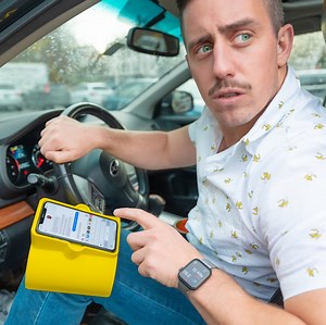 53K views · 822 reactions | The ThighPhone™️ Enjoy your phone while you drive. With our latest device, easily nestle your smartphone on your thigh at the perfect viewing angle in the driver seat. Simply slide it onto your leg of choice and drop your phone in. Shoot me a text while you’re at it +1 (802) 392-0259 and I’ll say what’s up. See why I built this invention  https://unnecessary.co/ThighPhone | Unnecessary Inventions | Facebook