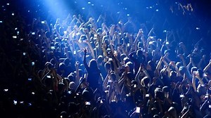 clip-1032372821-joyful-crowd-enjoys-listening-famous-group-rock