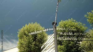 Direction sign with some European cities and distance to them.