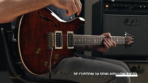 The PRS SE Custom 24 Semi-Hollow Piezo is a highly sophisticated and incredibly versatile instrument. The Custom 24 is the original design first introduced by PRS in 1985 as a solidbody guitar with maple top, mahogany back, dual humbuckers, and the patented PRS tremolo. This semi-hollow version adds natural resonance and a vibrant, organic tone. The humbuckers in this model are PRS 85/15 “S” pickups, which can be tapped via the push/pull tone control for more sounds. The addition of the LR Baggs