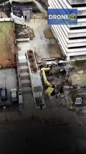 Drone 11 video captures an overhead view of the fallen excavator at a Washington County construction site. | WPXI-TV Pittsburgh