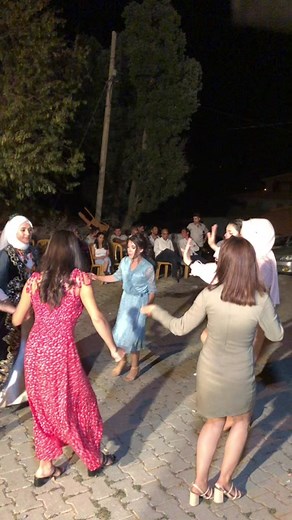Evening Dance Performance by Women in Diverse Attire