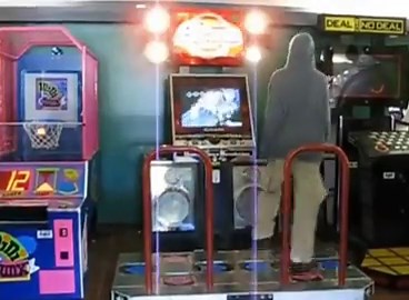 Adam playing dance dance revolution (DDR) in Danbury cinema.