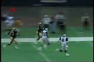 324 lb NFL player Larry Allen runs down a linebacker.