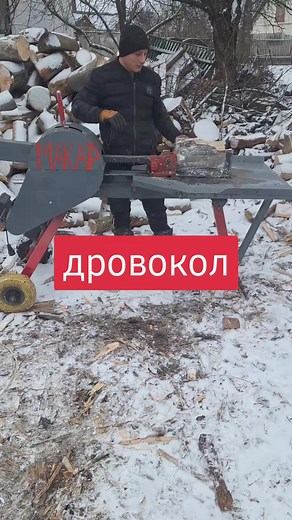 Manual Log Splitter Operation in Snowy Environment