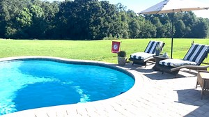 "Just wanted to say we are loving the pool and appreciate your help in the planning and for being upfront with us in the details like the slope of our yard. Our neighbor down the street went with another builder and got an unexpected additional 7K added for her slop after they already started" You made our Friday, Peggy! Thank you for texting us and sharing this video of your beautiful new pool. Hope you have a great weekend enjoying your new pool! | Blue Haven Pools on the Gulf