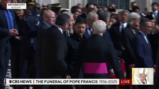 512K views · 13K reactions | Ukrainian President Volodymyr Zelenskyy enters Pope Francis' funeral to applause from those in attendance. Thousands are expected to be at the funeral service at the Vatican, including President Donald Trump and First lady Melania Trump. | CBS News | Facebook