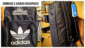 Buy Now: www.SuburbanBaseRecords.com In our mission to bring you the most exclusive most collectable items we present to you the world exclusive 'Suburban Base x Adidas Mash Up' a premium high end backpack! This backpack has the highly demanded Suburban Base Script logo embroidered on the top of the bag! Fit all your belongings in this bag like headphones, hard drives and accessories whilst showing off your junglist credentials alongside one of the most respected sports brands in the world. Ther