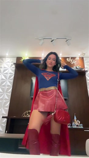 Superman Costume Showcase: Vibrant Outfit in Modern Setting