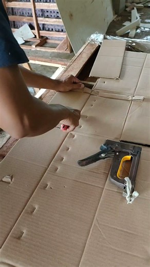 Installation of fabric covering the back of the divan backrest