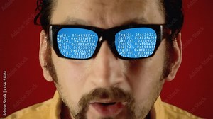 A funny ugly man with hypnotic glasses, looking at blue grad source code scrolling down (scrambled text from public domain).