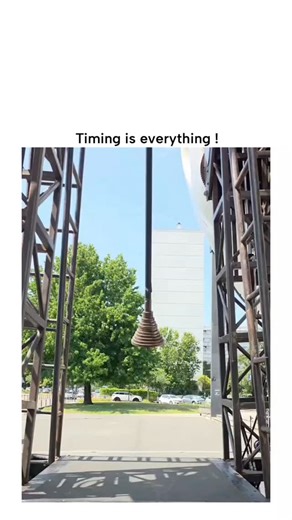 MemeFiore on Instagram: "The X post shares a viral clip from French circus performer Nicolas Sannier's "Lemniscate" production, showing him perched on a ledge dodging a massive swinging bell through precise synchronization, originally titled "Timing is Important" on Instagram with over 2 million views. Posted by on November 20, 2025, the video amassed 679,000 views and 749 likes within hours, drawing humorous replies comparing the stunt to childhood swings or suggesting therapy for the apparent 