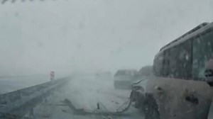 Massive pile-up as nearly 100 cars smash into one another on icy and foggy motorway