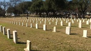 Volunteers clean up wreaths at cemetery where Richard Overton will be buried