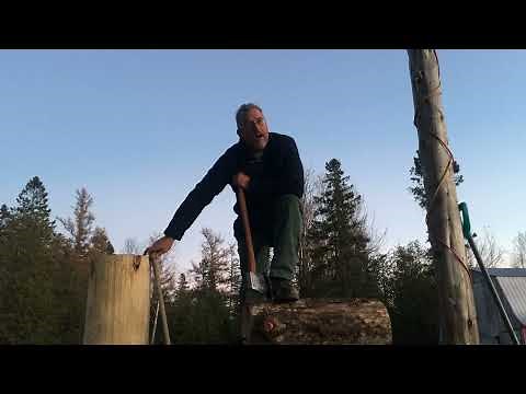 Chopping a log with an axe: Underhand chop