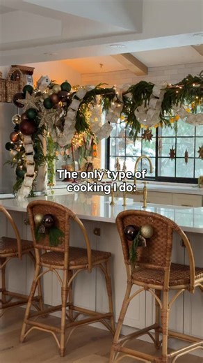 Wendy on Instagram: "This is the only cooking I do in the kitchen. K is actually the chef in this household. I decided to DIY a floating centrepiece over the kitchen island this year and it also doubles as a Photo Booth backdrop. I just used copper pipes to build the structure and decked it out to my heart’s content. I’ve made a similar structure over the dining table in the past! Ingredients sourced @homedepotcanada #christmasdecorations #christmasdiy #christmasdecor #holidaydecor #christmasdiy