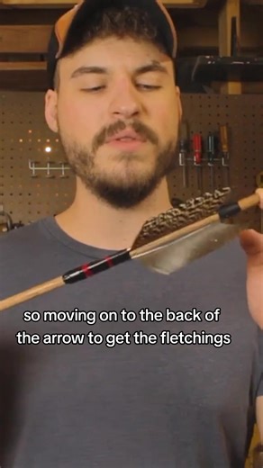 DIY arrow! This is how to make a arrow out of a wooden dowel rod, feathers and string. The head can be made out of anything but this one is